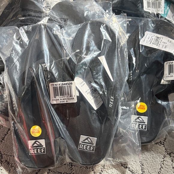 Reef Other - Reef Black Silver Flip-Flops with the bottle openers!